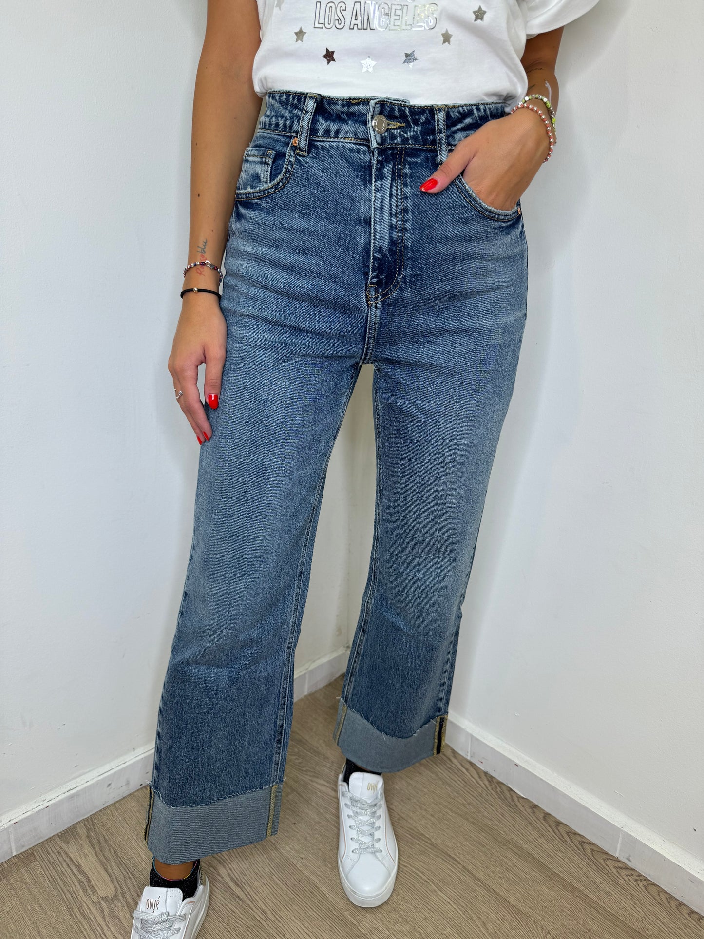 Jeans palazzo con risvolto